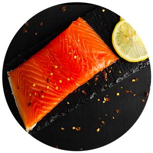 Alimenti che fanno bene ai capelli: salmone e semi di lino